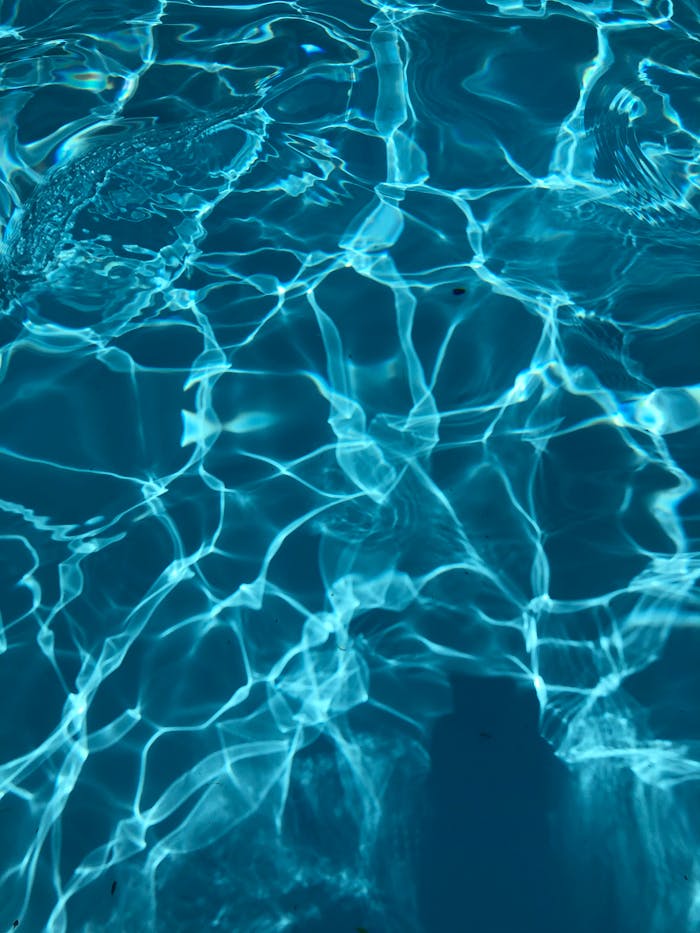 Crystal clear ripples and reflections in a Zurique swimming pool.